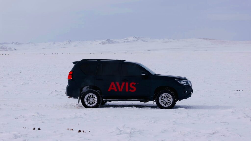 AVIS TOYOTA Prado 4x4 rental is comfortable for driving in winter in Mongolia