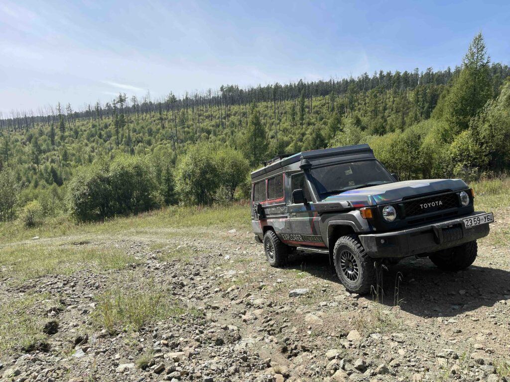 Driving rough wild roads to untouched areas in Mongolia with a 4x4 Toyota Landcruiser