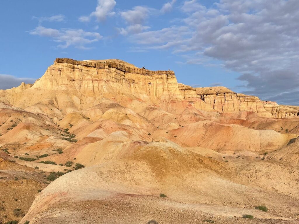 Dramatic fully lit view of the White Stupa at sunrise