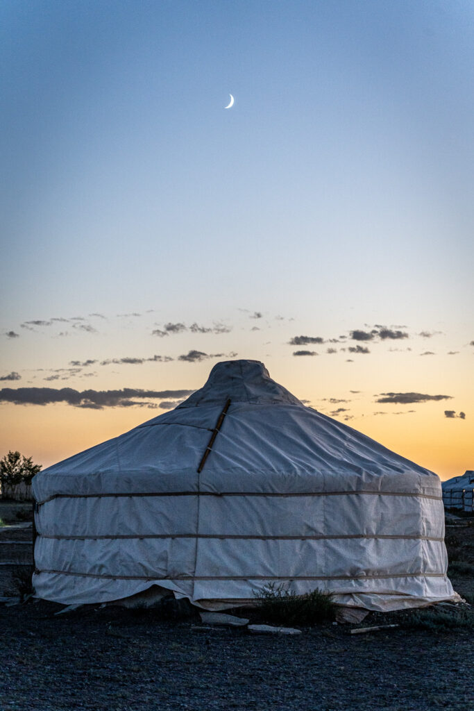 Ger camp with the moon above 